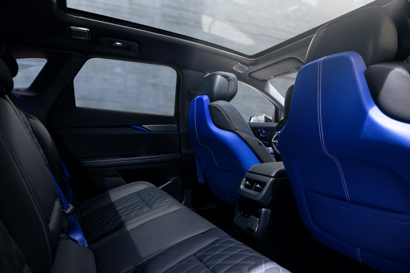 Back Seat View of the 2026 OPTIQ-V Blue Front Seats, Sun Roof, and Interior | Wiesner of Huntsville in Huntsville TX